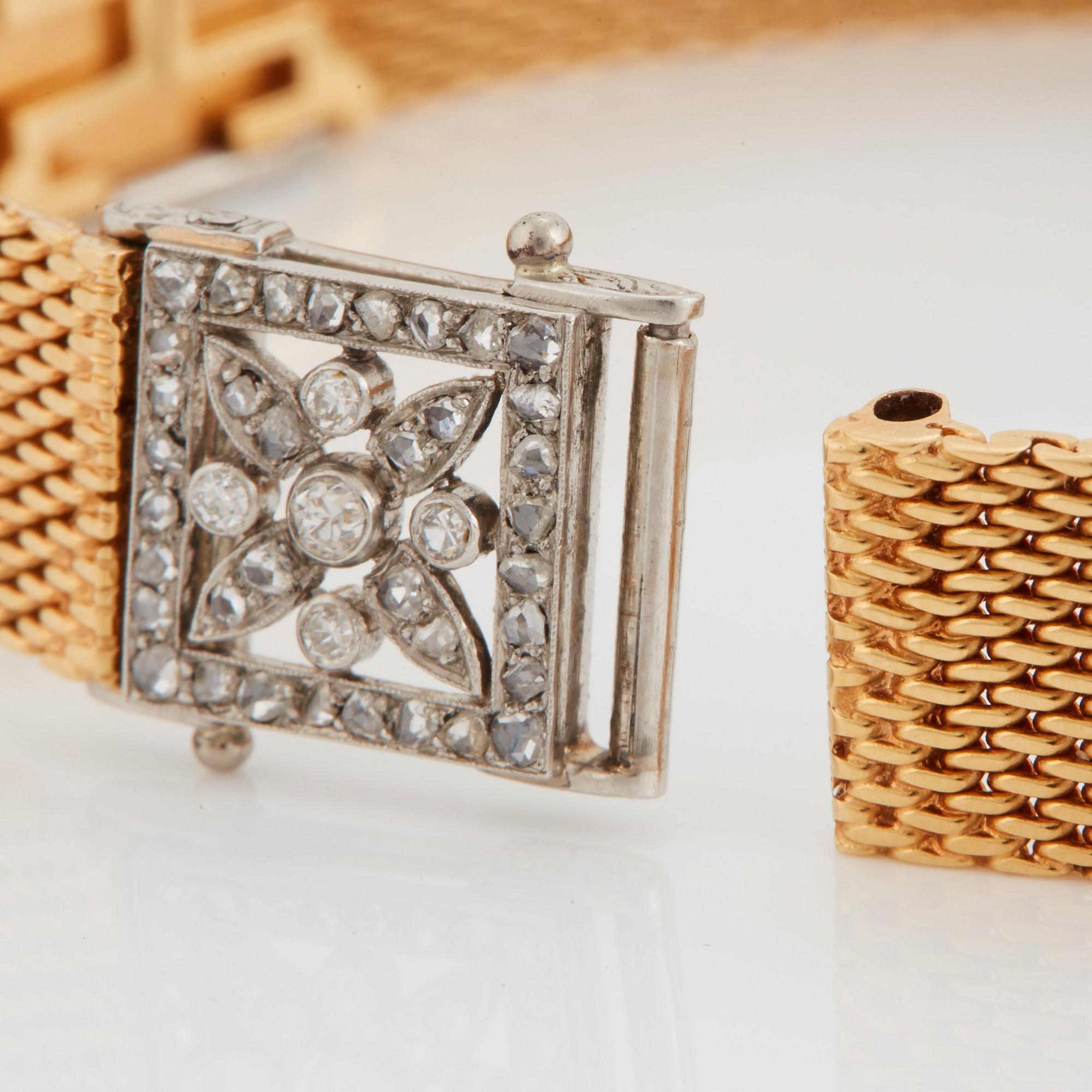 Armband 18K guld med motiv i platina med gammal- och rosenslipade diamanter.