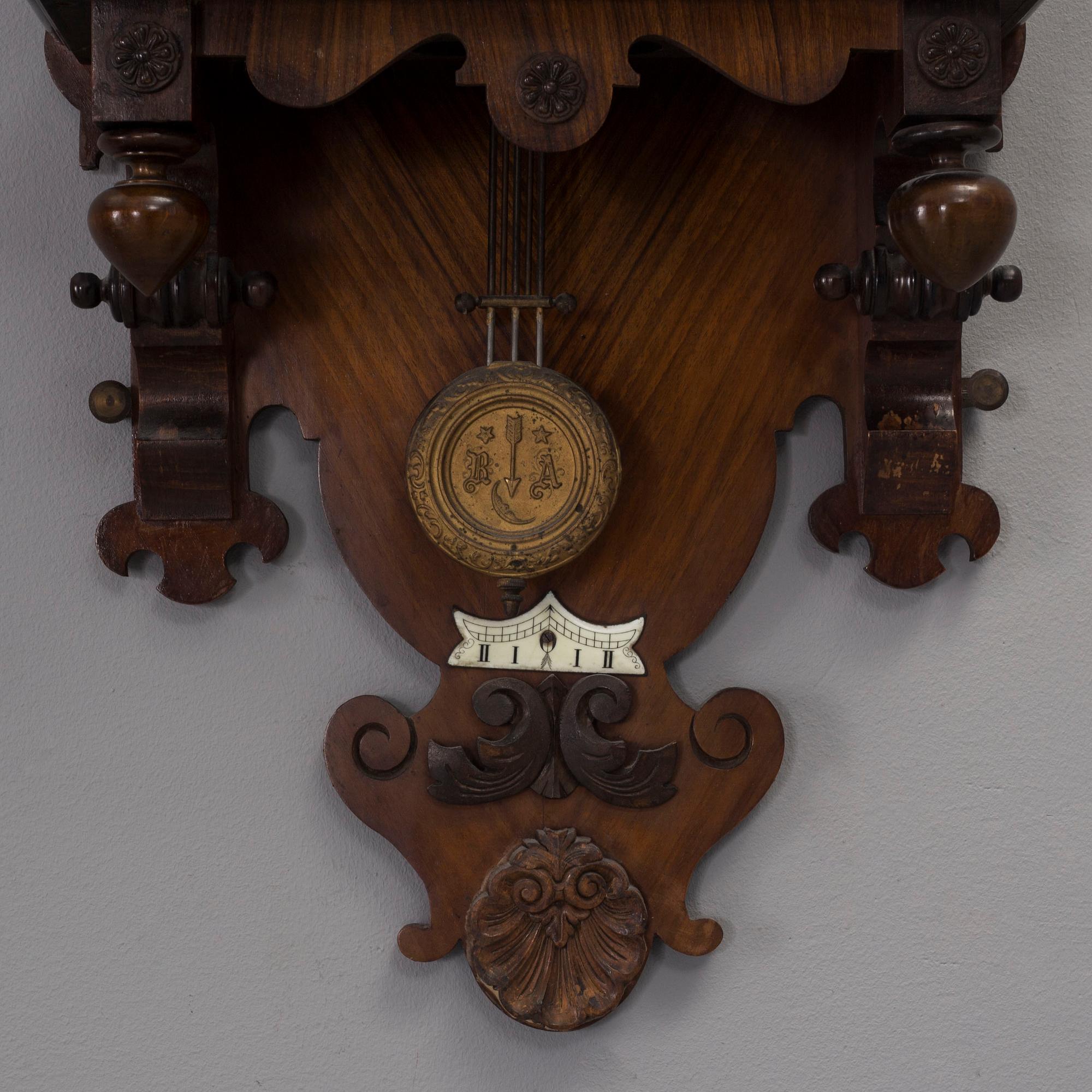 A circa 1900 Renaissance style wall clock.