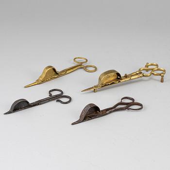 Four 18th century bronze and iron candle snuffers.