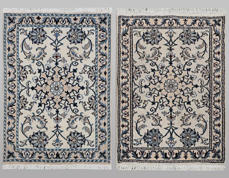 A pair of rugs, Nain, part silk, ca 83 x 58 cm & ca 80 x 60 cm.