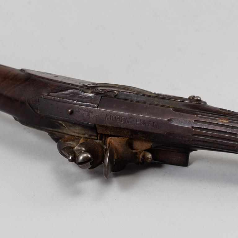 A Danish flint lock pistol signed, (Paul Nielsen Norrman, ca 1700).