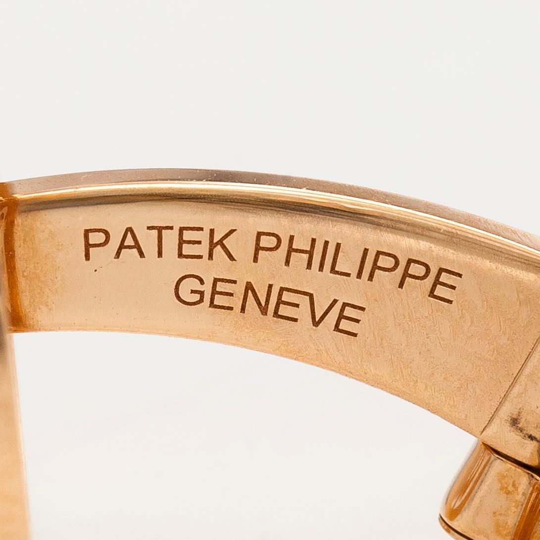 Patek Philippe, a pair of 18K gold "Calatrava" cufflinks.