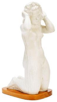 534. A Harald Salomon stoneware sculpture of a female in the nude, Rörstrand 1944.