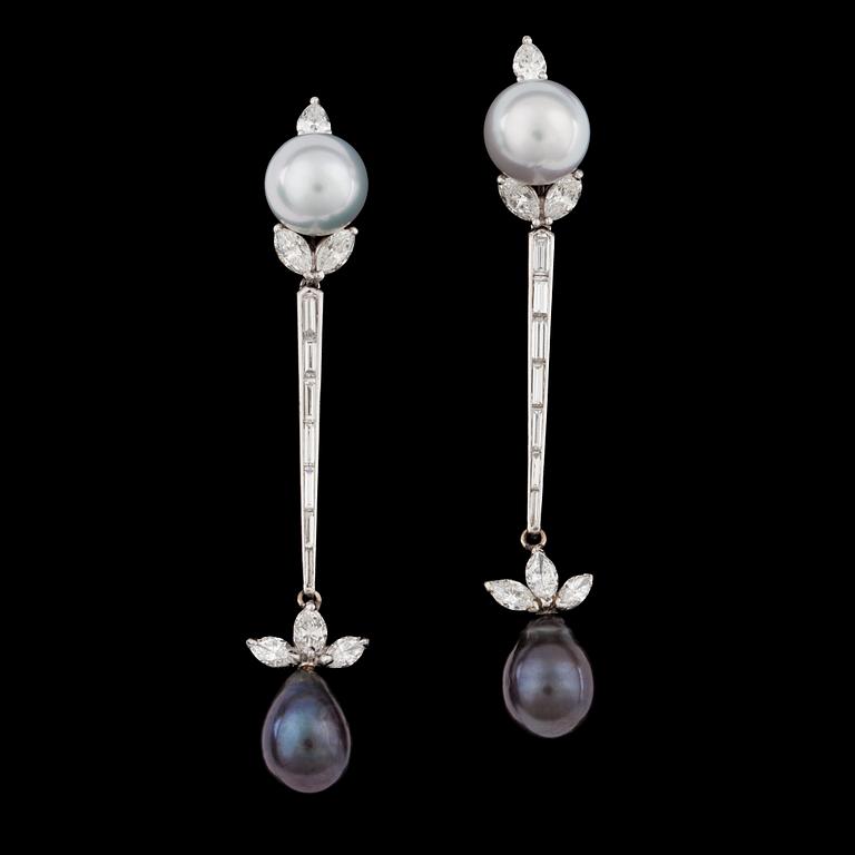 A pair of diamond, tot. 4 cts and cultuled South sea and Tahtiti pearl earrings.