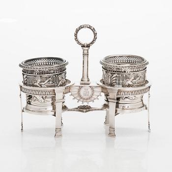 A French Empire silver cruet stand and a pair of openwork stands, Paris 1819-1838.