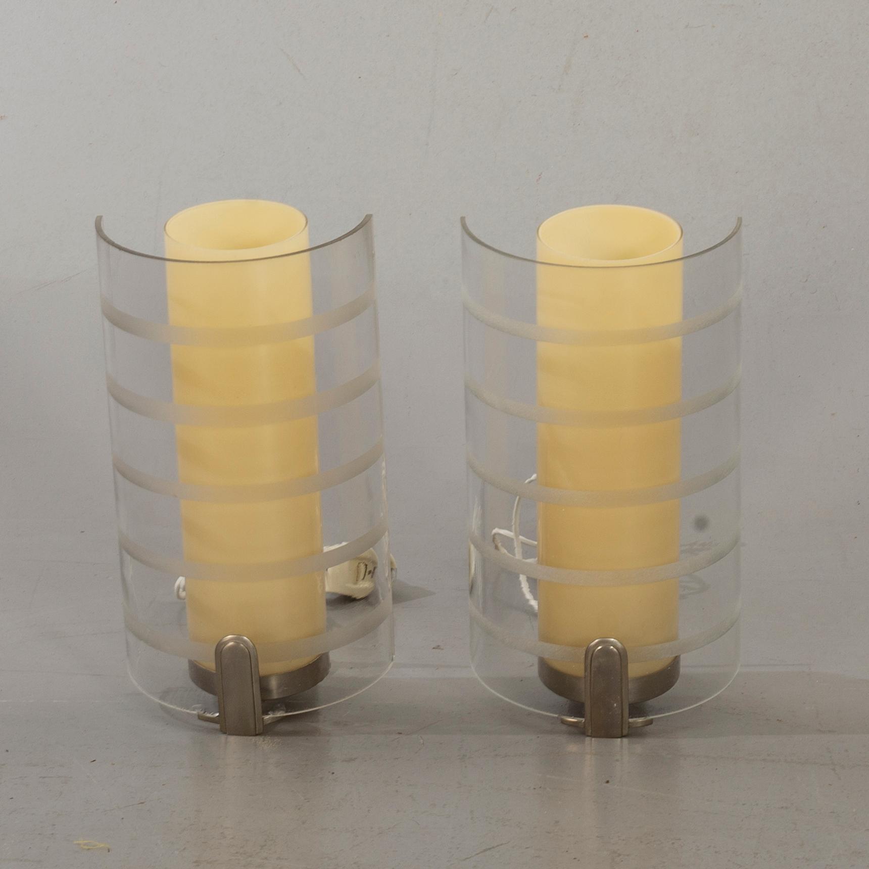 A pair of Swedish Art Deco wall lamps.