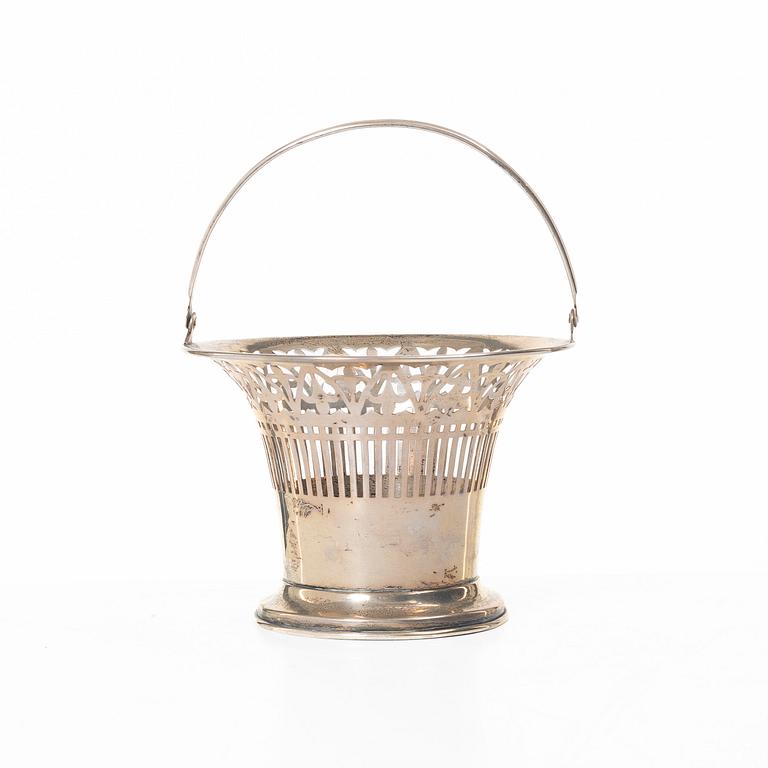 A sterling silver bowl with handle, signed with monogram CMM, 20th century.