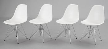 A set of four "Plastic Chairs" by Charles and Ray Eames for Vitra, 2001.