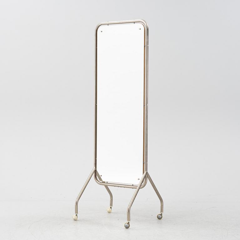 A mid 20th Century floor mirror on wheels.