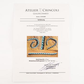 A bracelet in 18K white gold with step-cut emeralds and round and navette-shaped brilliant-cut diamonds.