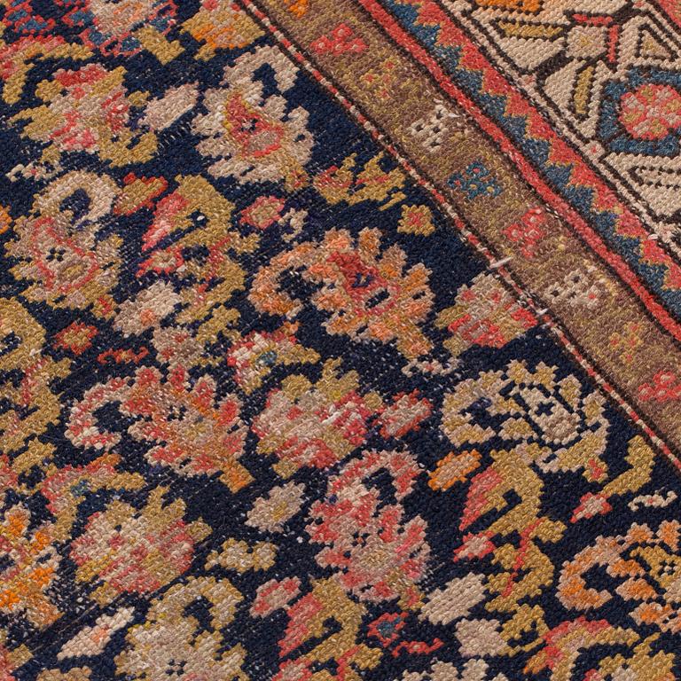 A semi-antique Malajir runner, around 245 x 95 cm.