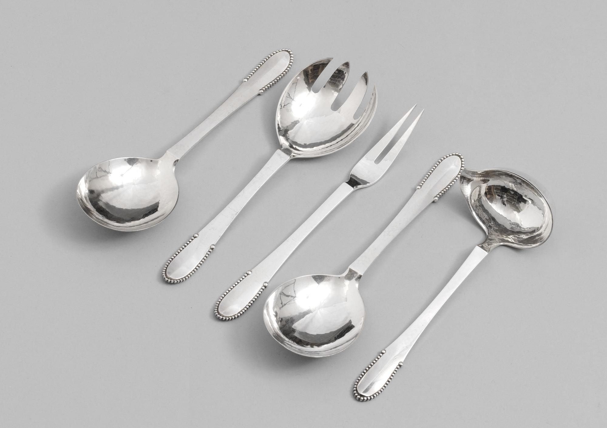 Five Georg Jensen "Kugel" silver servers, Copenhagen 1945-77.