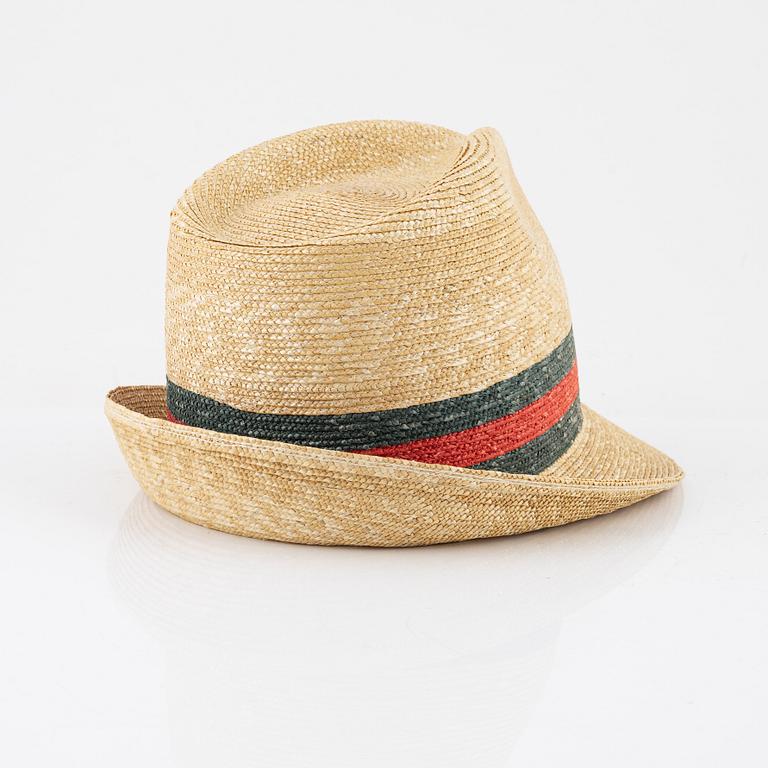 Gucci, a straw hat, size M.