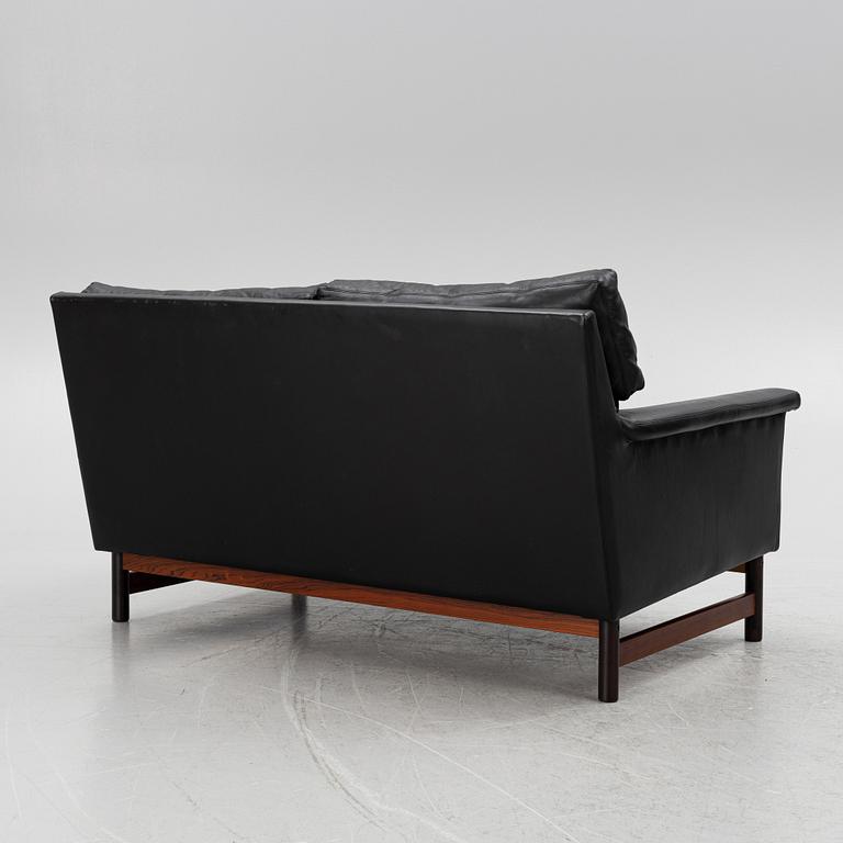 Two leather upholstered sofas and an armchair, IKEA, Sweden, 1960's/70's.