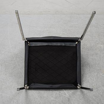 A set of eight steel and leather chairs, 21th century.