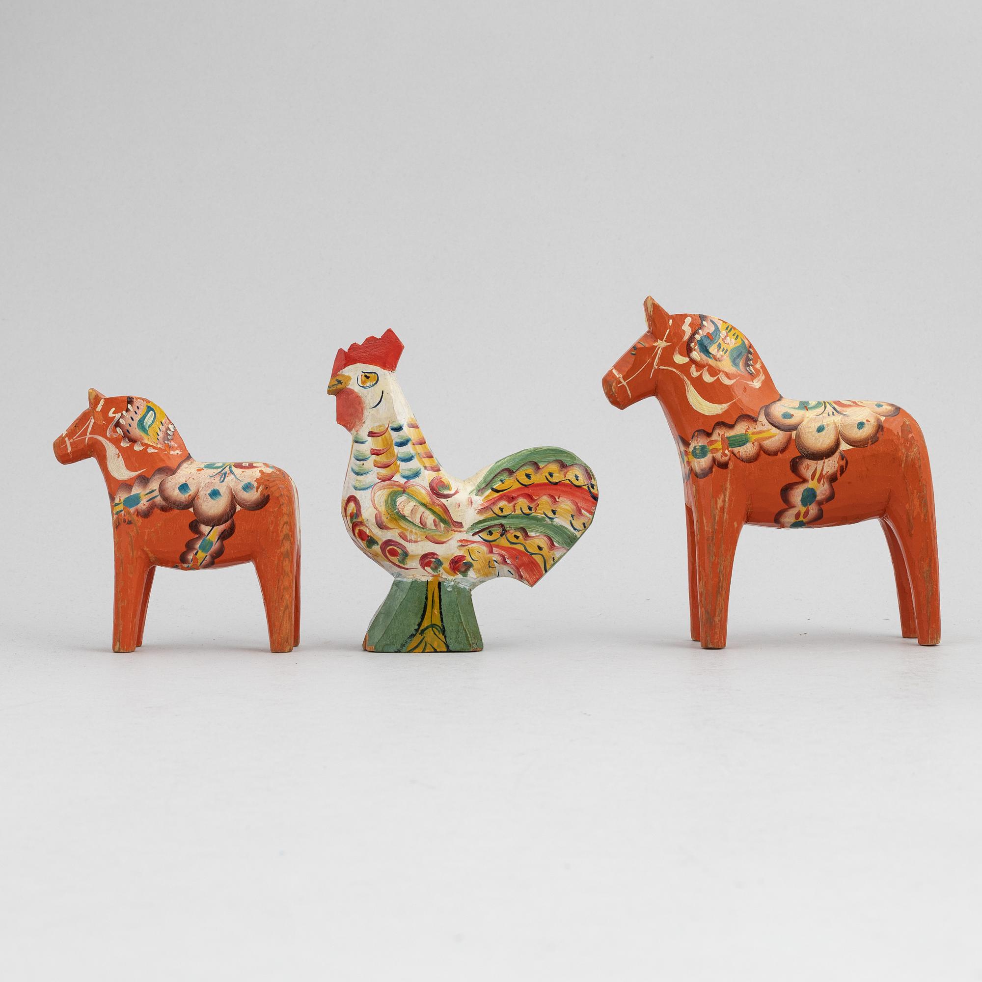 A set of painted wooden horses and roosters from Dalarna, Sweden, mid 20th century and late 20th century.