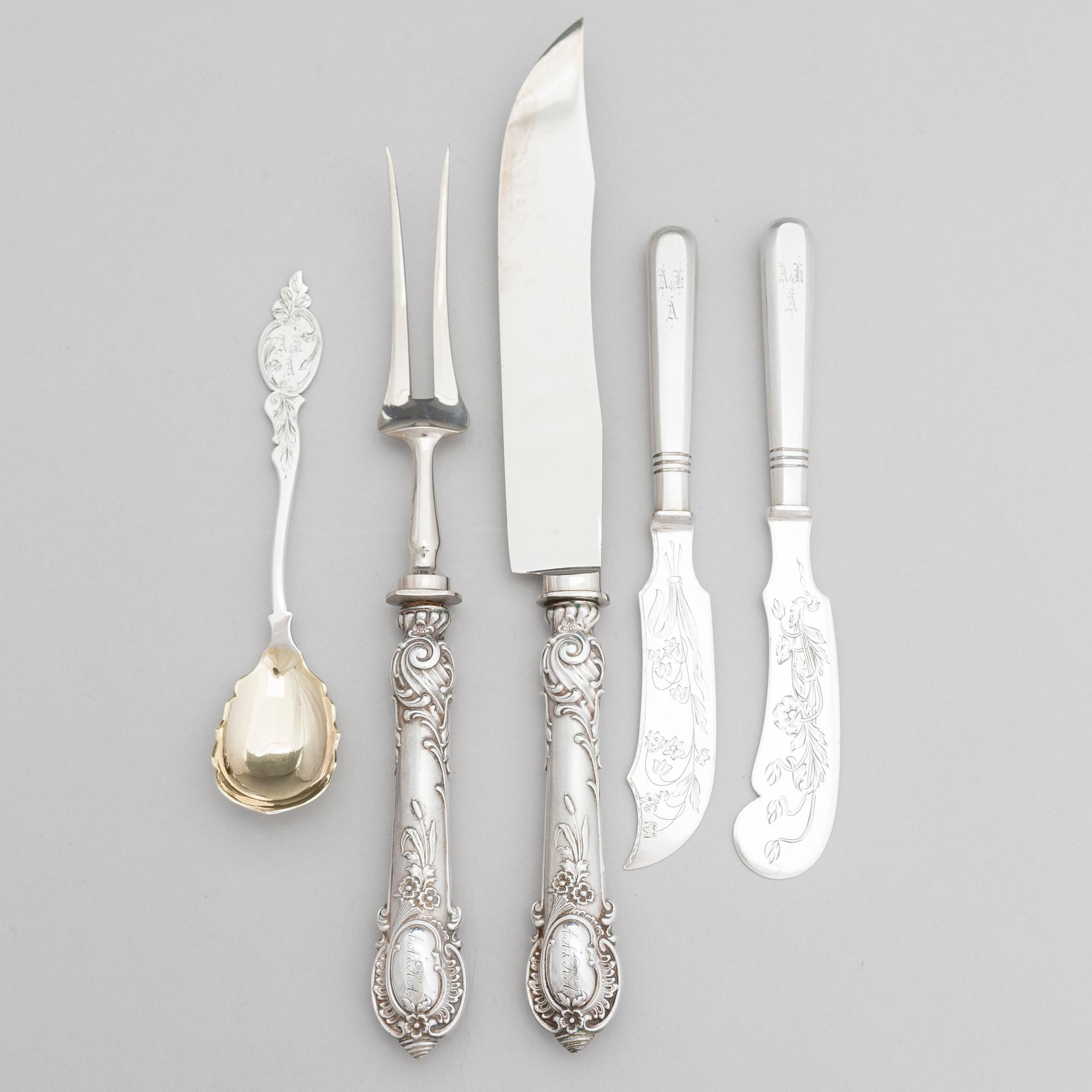 Silver serving cutlery, three with mark of Ferdinand Timper, Helsinki 1901-02 and a pair with German marks, ca. 1900.