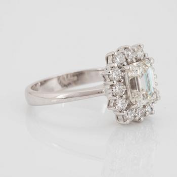 An 18K gold ring set with an emerald-cut diamond 2.04 cts quality J vs1.