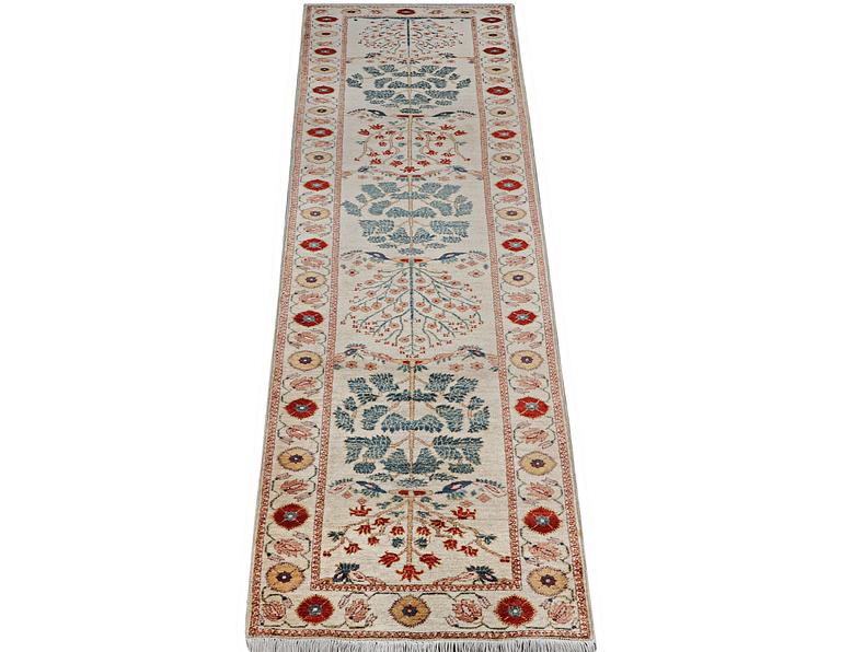 A runner carpet, Ziegler Design, ca. 433 x 85 cm.