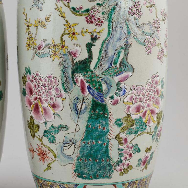 A pair of famille rose floor vases, 20th century.