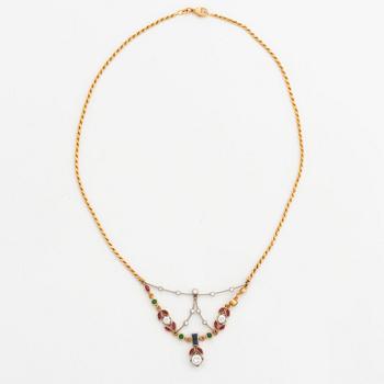 diamond, rubies, and emerald and sapphire necklace.
