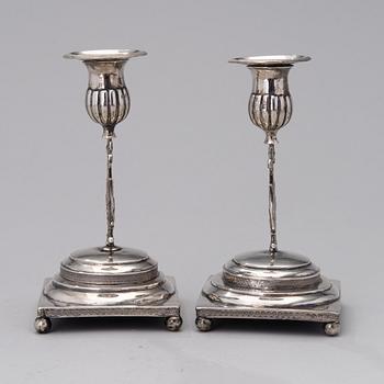 A PAIR OF FINNISH SILVER CANDLESTICKS, Wilhelm Fahlström 1818-1828, Helsinki.