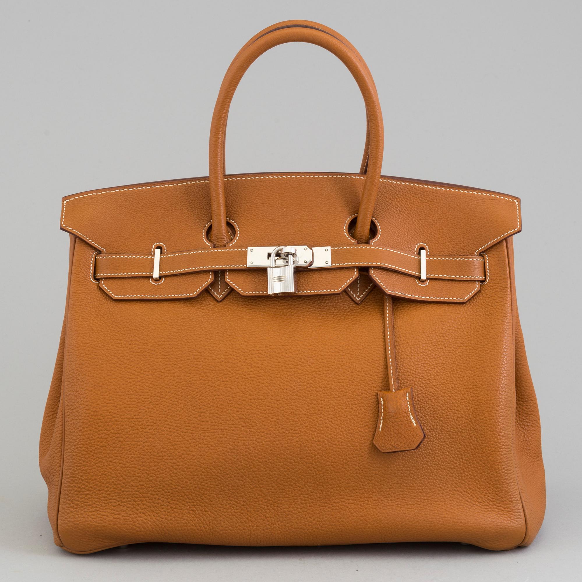 A gold togo Birkin 35 handbag by Hermès from 2004.