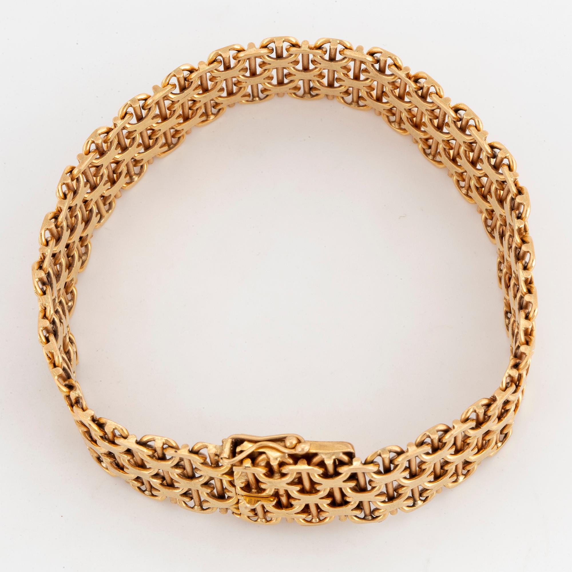 ARMBAND, krysslänk. 18K guld.