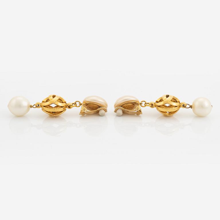 Chanel, a pair on gold tone and pearl clip-on earrings.