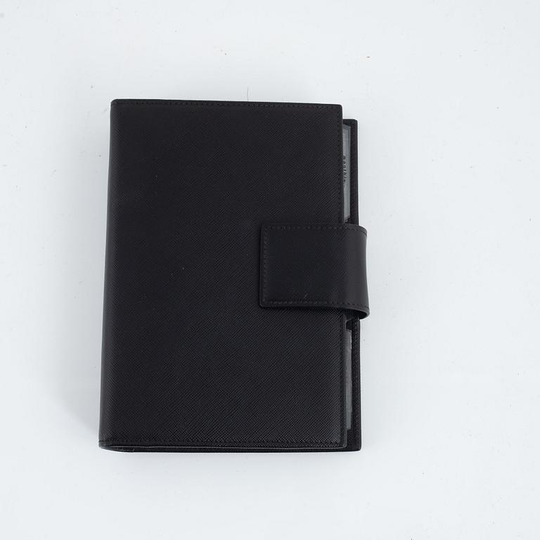 Prada, agenda.