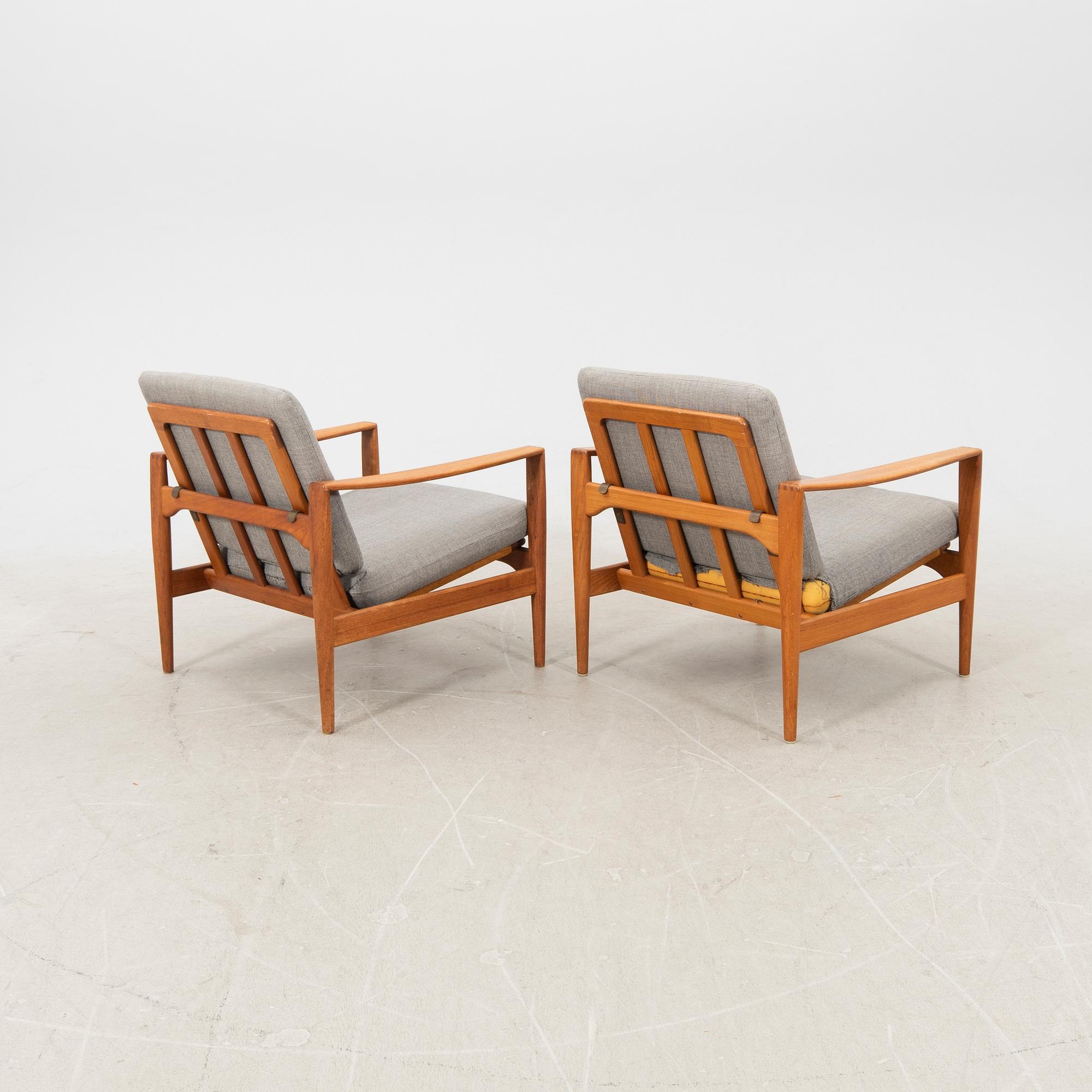 A pair of teak easy chairs, Denmark middle fo the 20th century.