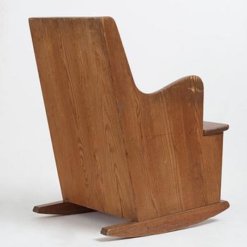 Axel Einar Hjorth, a stained pine "Lovö" rocking chair, Nordiska Kompaniet, 1930's.