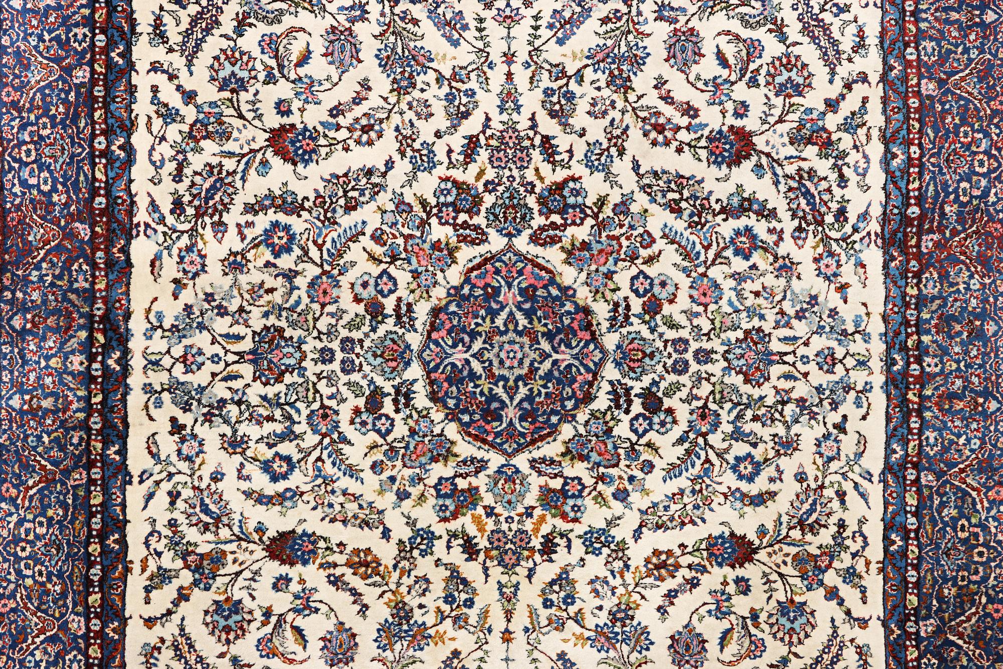 An oriental carpet, c. 308 x 220 cm.