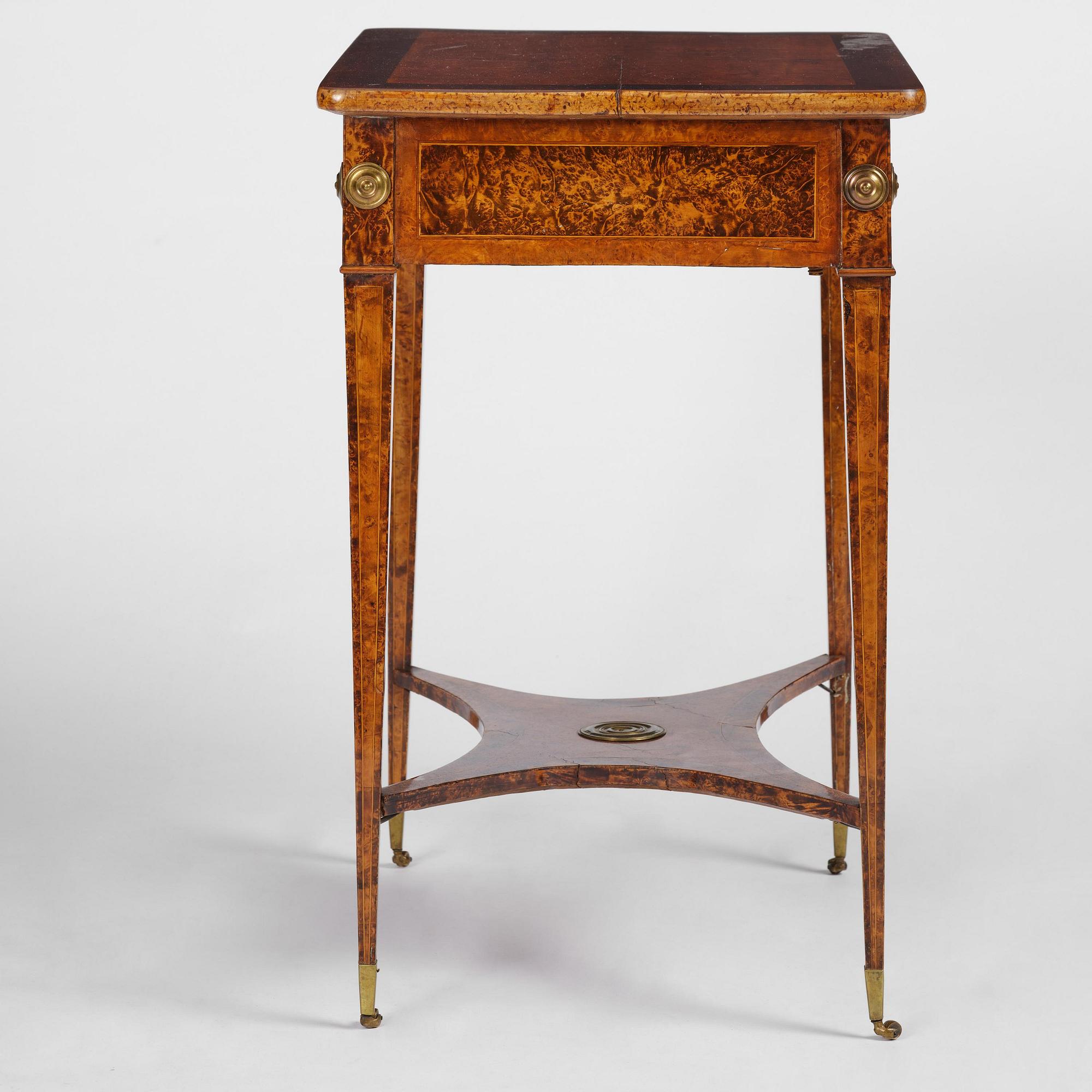 A Gustavian burr-parquetry and bilt brass-mounted table by A. Lundelius (master in Stockholm 1778-1823).