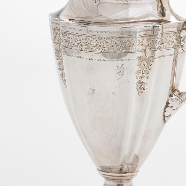 A five-piece sterling silver coffee and tea service, and 12 spoons, USA, first quarter of the 20th century.