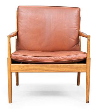 974. An Ib Kofoed Larsen "Samsö" teak and brown leather easy chair, OPE möbler, Sweden.