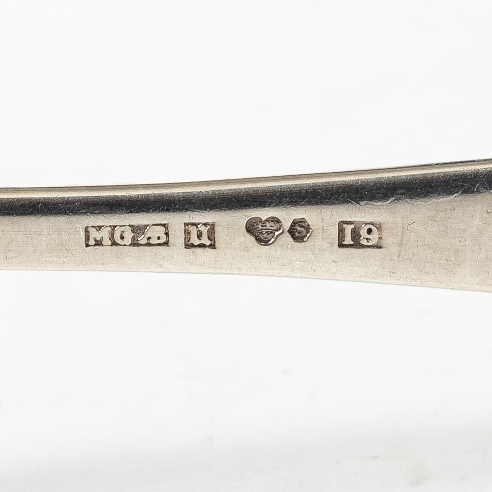 21 pieces of silver cutlery, 1807 - mid 20th century.