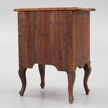 A Rococo-style chest of drawers, 19th century.