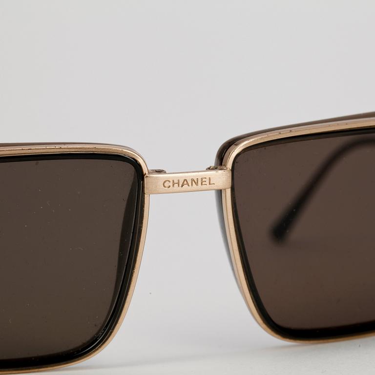 CHANEL, a pair of sunglasses.