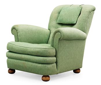 A Josef Frank armchair by Svenskt Tenn.