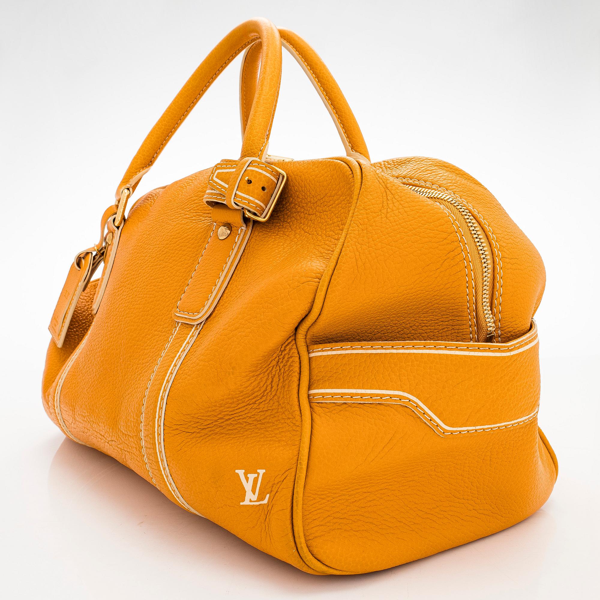 Louis Vuitton, a 'Tobago Carryall' bag.