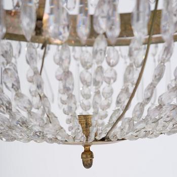 A late Gustavian gilt brass and cut glass seven-light chandelier, Stockholm late 18th century.