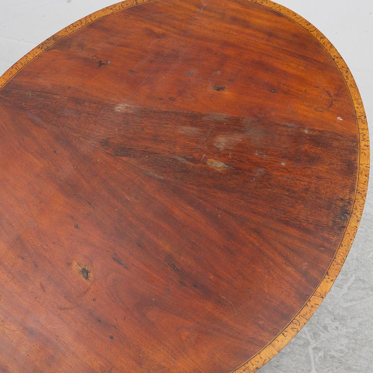 An Empire sewing table, mid-19th Century.