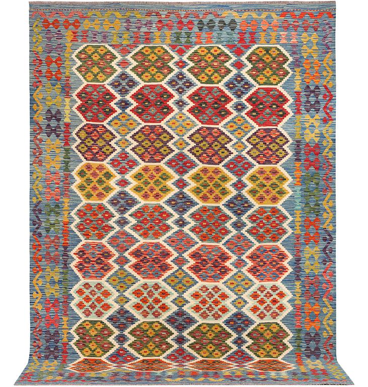 An Afghan Kilim carpet, c. 297 x 206 cm.