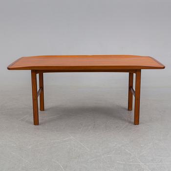 a late 20th century teak table.