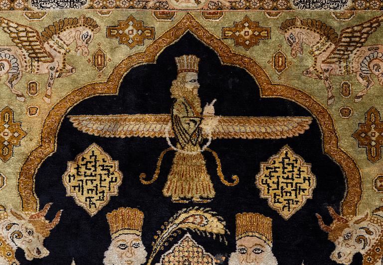 A pictorial semi-antique silk Qum rug, central Persia, c. 214 x 146 cm.