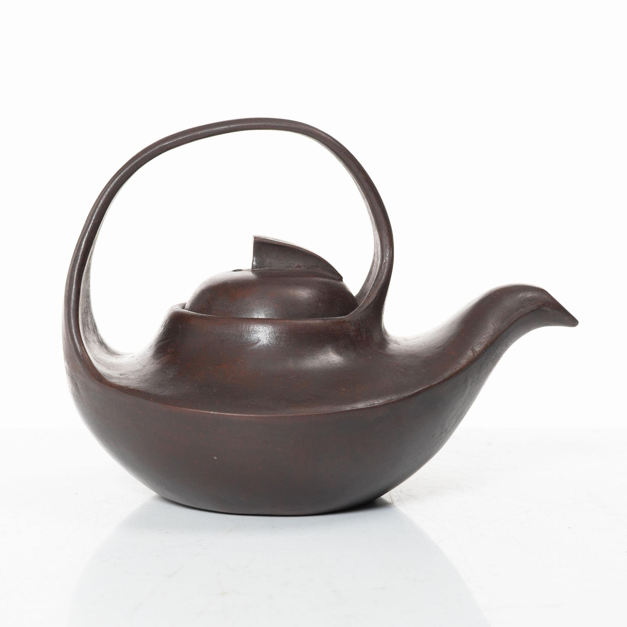 A Chinese compressed yixing teapot and cover, 20th century.