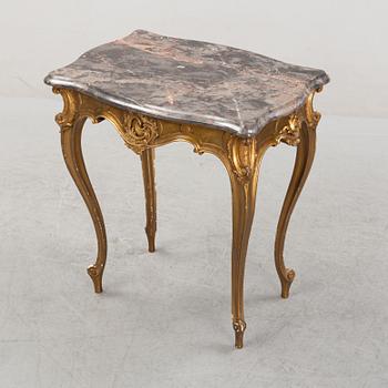 A rococo style table, around 1900.