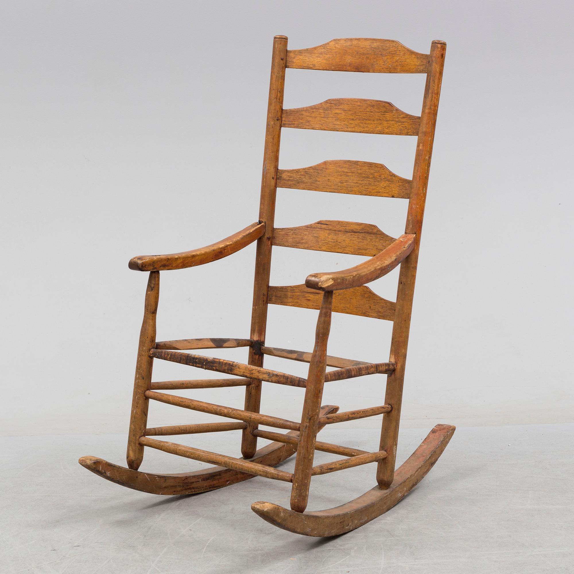 A 18th/19th century rocking chair.