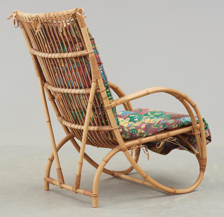 A Josef Frank rattan easy chair, Svenskt Tenn, 1950's.